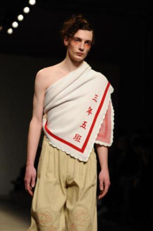 Milano Moda Uomo la sfilata di Moto Guo